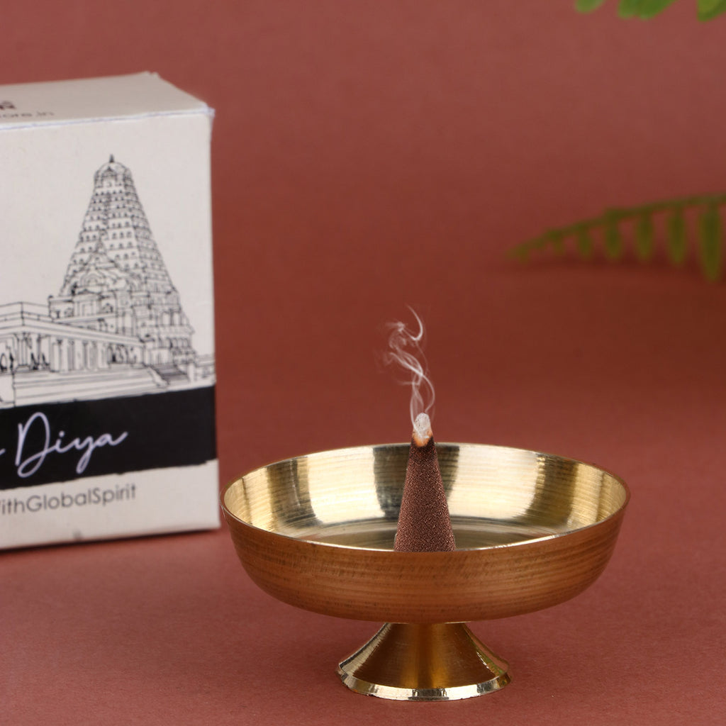 1-inch brass dhoop/candle stand, compact and sturdy design used for holding dhoop cones or candles during pooja and spiritual rituals. 
India’s Largest Pooja Accessories Brand – www.satvikstore.in 