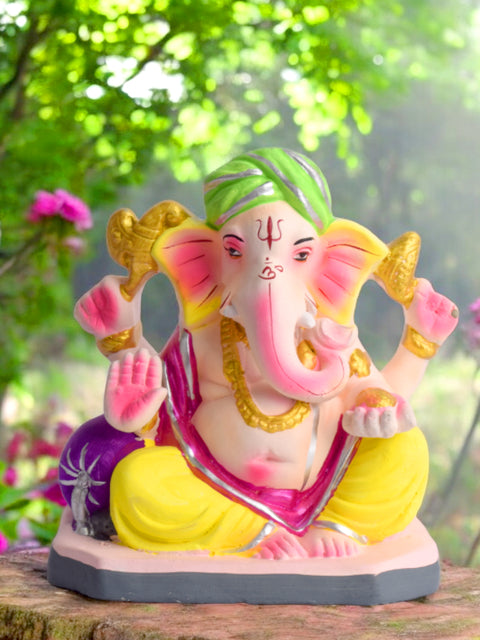 Colorful 6 Inch eco-friendly Ganesha idol seated in Padmasana pose, ideal for Ganesh Chaturthi puja and home decor. India’s Largest Pooja Accessories Brand – www.satvikstore.in