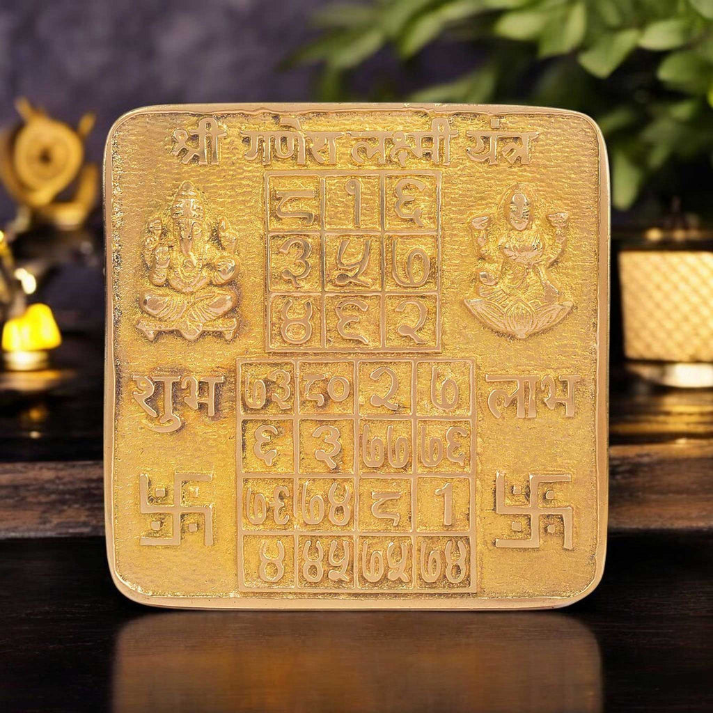 Brass Shree Ganesh Laxmi Yantra intricately engraved with symbols of prosperity and obstacle removal—ideal for wealth attraction, business success, and spiritual balance. India’s Largest Pooja Accessories Brand - www.satvikstore.in


