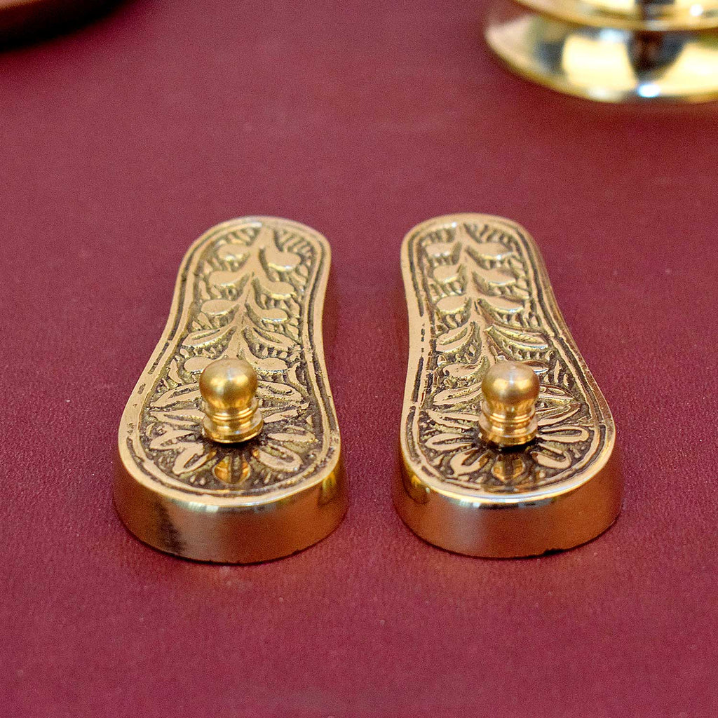"Divine Brass Charan Paduka (Khadau) for Temple and Home Mandir Worship placed for spiritual offerings". 
India’s Largest Pooja Accessories Brand - www.satvikstore.in