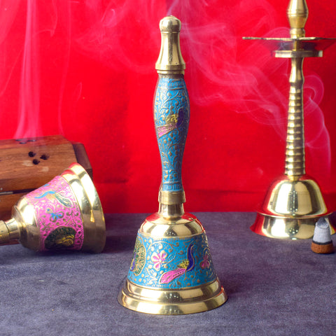 Handcrafted brass puja bell with vibrant blue handle, perfect for temple rituals and home prayers, enhancing spiritual ambiance. India’s Largest Pooja Accessories Brand – www.satvikstore.in