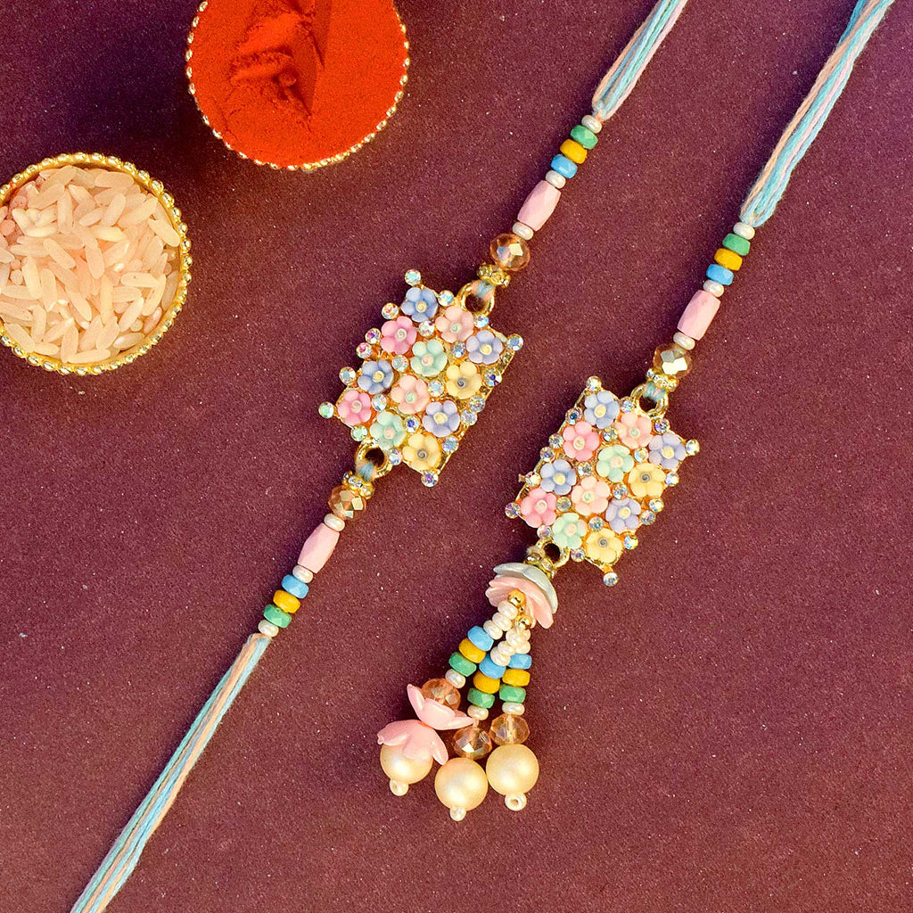 Designer Couple Rakhi Set for Bhaiya and Bhabhi with Roli Chawal and Ram Sita Stickers – Raksha Bandhan Gift Combo. India’s Largest Brass Idols Brand - www.satvikstore.in