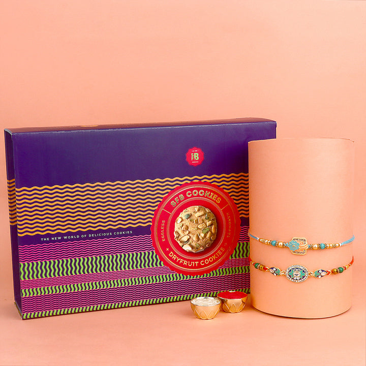 Image of a beautifully designed Rakhi with sweets, the perfect combination of tradition and sweetness for Raksha Bandhan celebration. Shop now at SatvikStore.in. #Rakhi #RakhiOnline #SendRakhi #DesignerRakhi #BeautifulRakhi #LatestRakhi #NewRakhi #ModernRakhi"