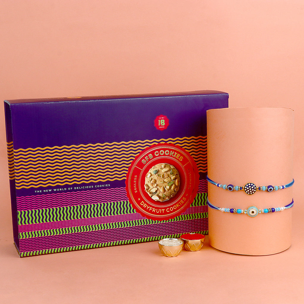 Image of a beautifully designed Rakhi with sweets, the perfect combination of tradition and sweetness for Raksha Bandhan celebration. Shop now at SatvikStore.in. #Rakhi #RakhiOnline #SendRakhi #DesignerRakhi #BeautifulRakhi #LatestRakhi #NewRakhi #ModernRakhi