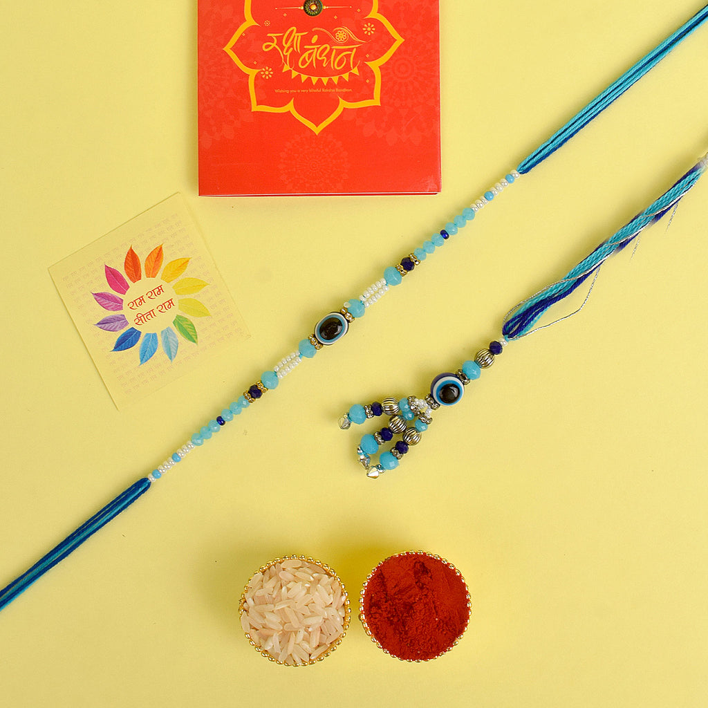 Designer Couple Rakhi Set for Bhaiya and Bhabhi with Roli Chawal and Ram Sita Stickers – Raksha Bandhan Gift Combo. India’s Largest Brass Idols Brand - www.satvikstore.in