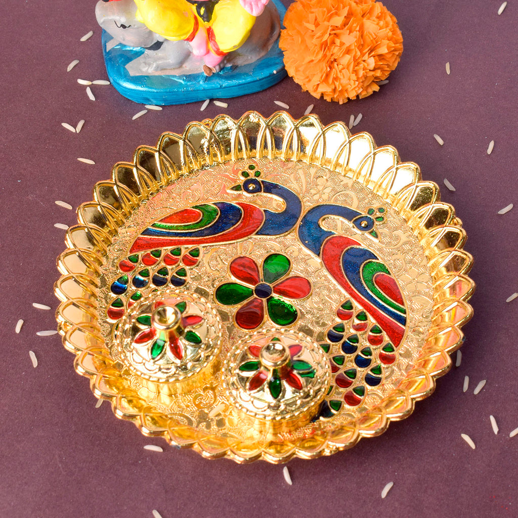 Kumkum holder with artistic peacock design, featuring traditional craftsmanship and vibrant detailing for pooja use. 
India’s Largest Pooja Accessories Brand – www.satvikstore.in 