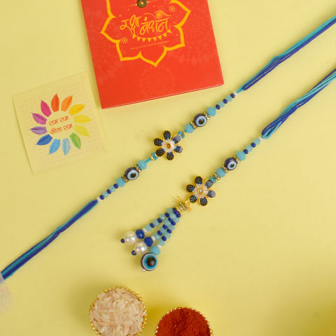 Designer Couple Rakhi Set for Bhaiya and Bhabhi with Roli Chawal and Ram Sita Stickers – Raksha Bandhan Gift Combo. India’s Largest Brass Idols Brand - www.satvikstore.in