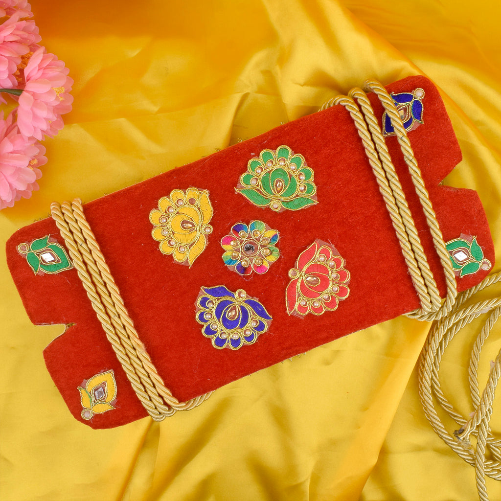 Beautiful and gracefully handcrafted red floral Jhula designed especially for Hariyali Teej celebrations, adorned with vibrant artificial flowers and elegant embellishments India’s Largest Pooja Accessories Brand – www.satvikstore.in