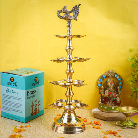 Brass 4 Step Panchmukhi Peacock Kerala Diya – Handcrafted brass diya with a four-step structure, Panchmukhi (five-faced) design, and peacock motif, perfect for pooja rituals, temple lighting, and traditional décor. India’s Largest Pooja Accessories Brand – www.satvikstore.in