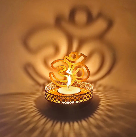Handcrafted OM Shadow Diya, an intricately designed lamp showcasing the sacred OM symbol. When lit, it casts a divine shadow, perfect for spiritual rituals, meditation, or adding a touch of elegance to your home decor. India’s Largest Pooja Accessories Brand – www.satvikstore.in